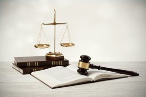 lawyer's law book, gavel and scales of justice