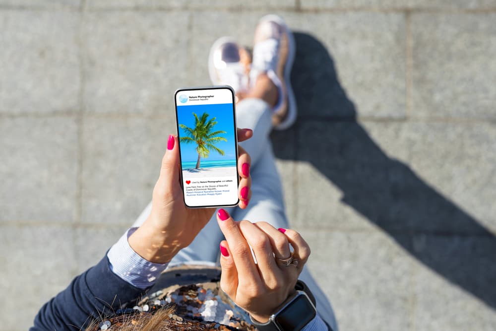 Woman viewing photos on her phone